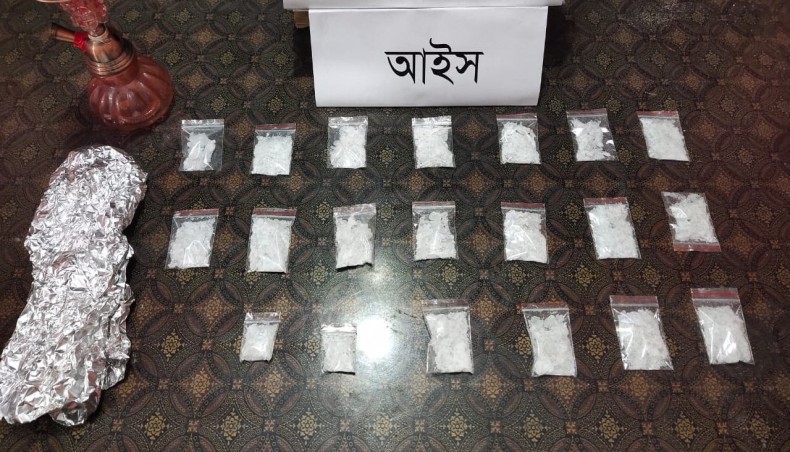 Members of Rapid Action Battalion arrest two alleged drug peddlers with 140 grams of Crystal Meth in Chattogram on Thursday.- Press Release photo