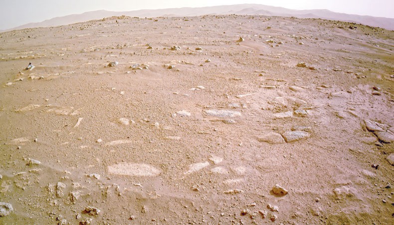 This NASA photo released on Wednesday shows images from NASA’s Mars 2020 Perseverance rover of its new home in Jezero Crater on February 21, after touching down on the Red Planet on February 18. — AFP photo