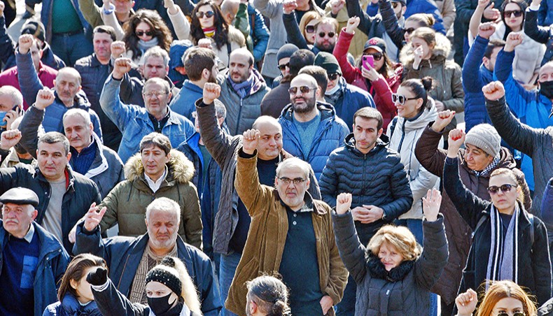 Opposition supporters rally outside the National Assembly building to demand prime minister Nikol Pashinyan’s resignation over his handling of last year’s war with Azerbaijan, in Yerevan on Friday. — AFP photo