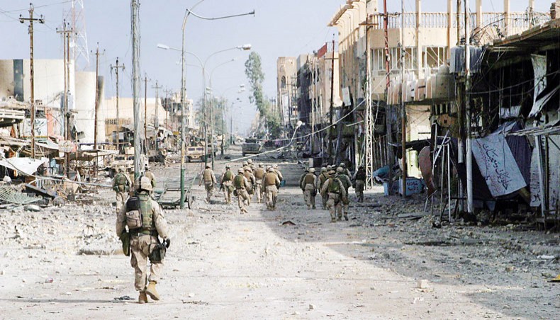 A street in Fallujah, Iraq heavily damaged by fighting on November 15, 2004. — Consortium News/US marine corps/James J Vooris