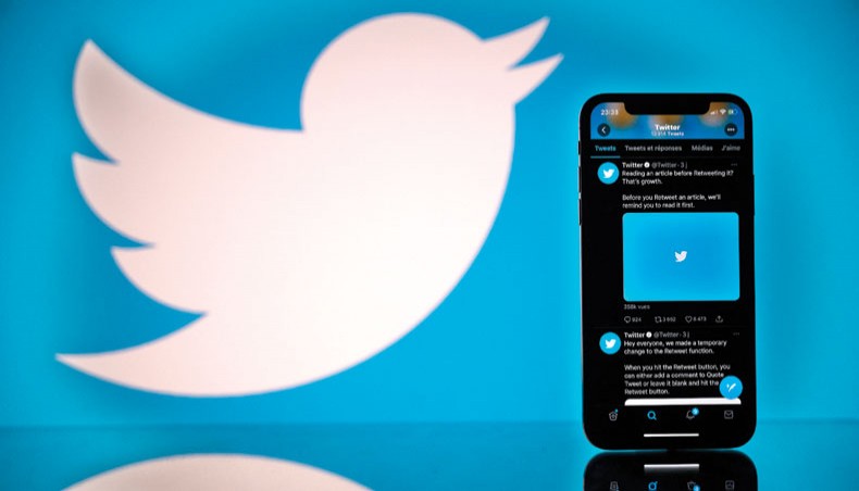 A file photo shows the logo of US social network Twitter displayed on the screen of a smartphone and a tablet in Toulouse, southern France. Twitter said February 25, 2021 it wants to swell its ranks of users, offer more features, and double revenue in the next two years. — AFP photo