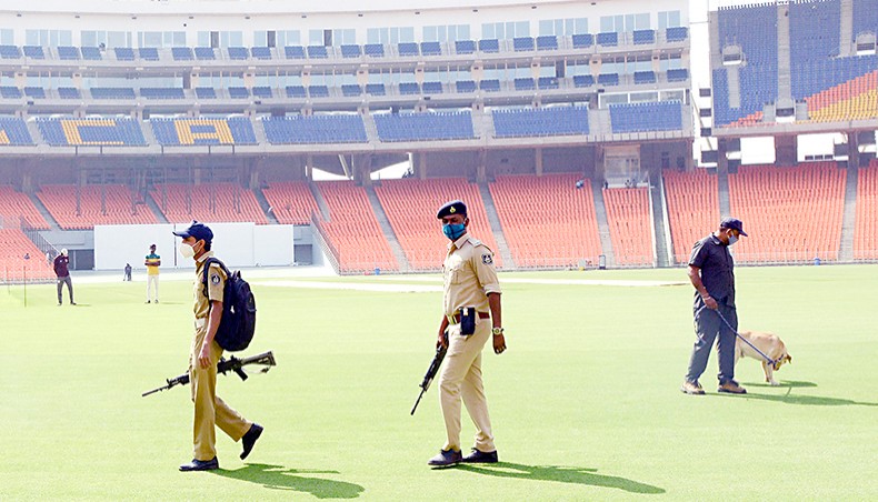 Police personnel inspect the Sardar Patel Stadium, the world’s biggest cricket stadium, ahead of the third Test match between India and England, in Motera on the outskirts of Ahmedabad on February 17. — Agence France-Presse/Sam Panthaky