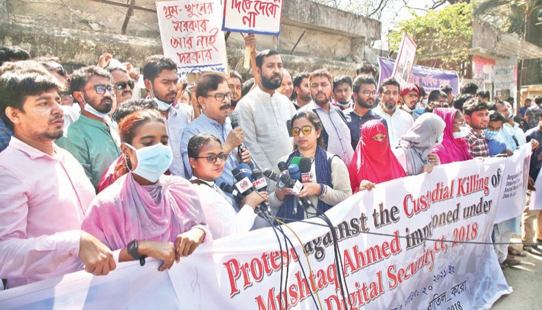Nagorik Oikya convener Mahmudur Rahman Manna addresses a rally in front of the National Press Club in Dhaka on Saturday organised to protest against the custodial death of writer Mushtaq Ahmed and to demand the scrapping of the Digital Security Act. — New Age photo