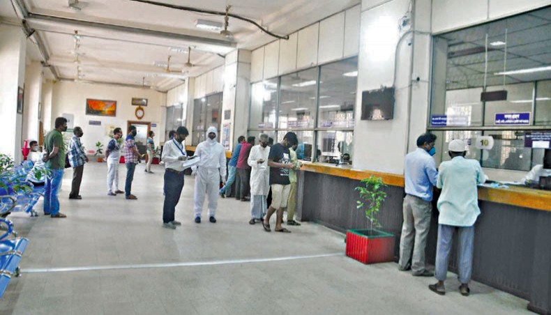 A file photo shows clients receiving services at a branch of a state-owned bank in the capital. Capital shortfalls in 10 banks swelled by 50.36 per cent or Tk 9,695.89 crore in the October-December period of the year 2020 as a number of state-owned banks had to keep higher provision against their defaulted loans.— New Age photo