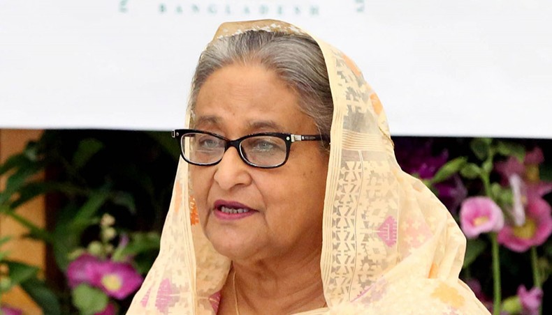Prime minister Sheikh Hasina addresses the opening ceremony of National Insurance Day-2021 at the Bangabandhu International Conference Centre, joining virtually from her official residence Ganabhaban in Dhaka on Monday. — Focusbangla photo