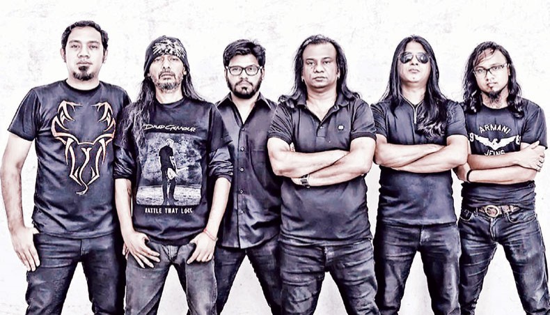 Sheikh Monirul Alam Tipu, third from right, along with members of Warfaze poses for a photo.
