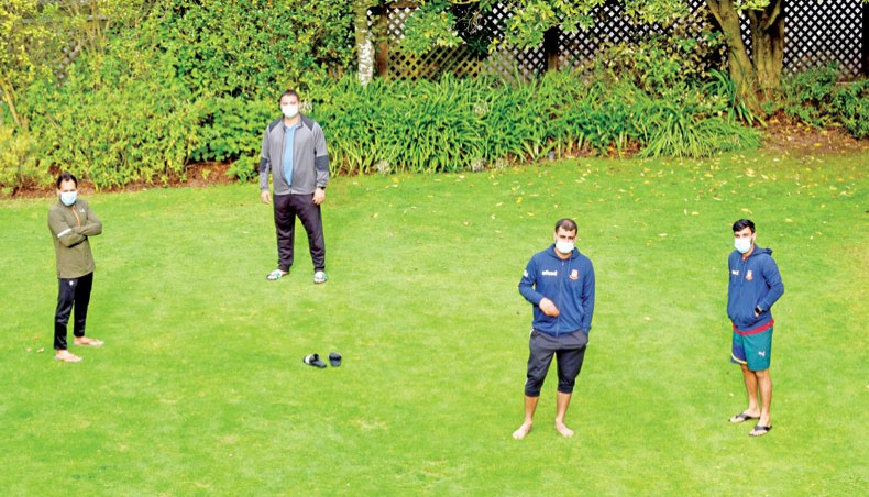 A group Bangladesh players are seen in front of their team hotel in Christchurch on Tuesday. — BCB photo