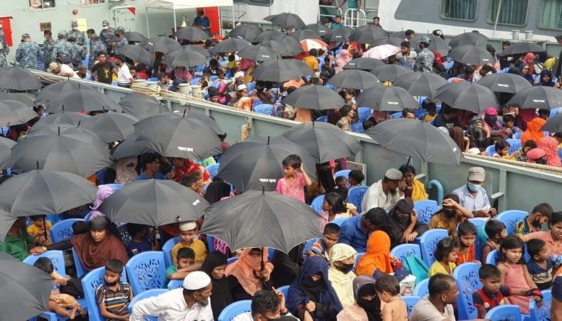 Rohingya people are on board in a Bangladesh Navy ship in Chattogram before heading for Bhasan Char on Wednesday.- New Age photo