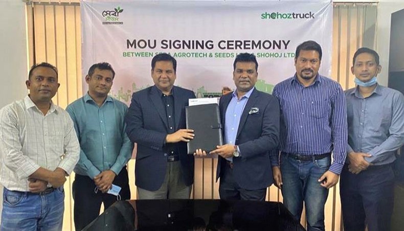 Participants pose for a photo session at an MoU signing programme between Shohoj and Seba AgroTech recently. — Press Release