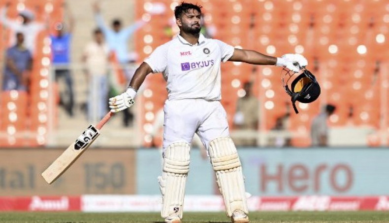 India's Rishabh Pant celebrates after scoring a century (100 runs) on the second day of the fourth Test cricket match between India and England at the Narendra Modi Stadium in Motera on March 5, 2021.- AFP photo