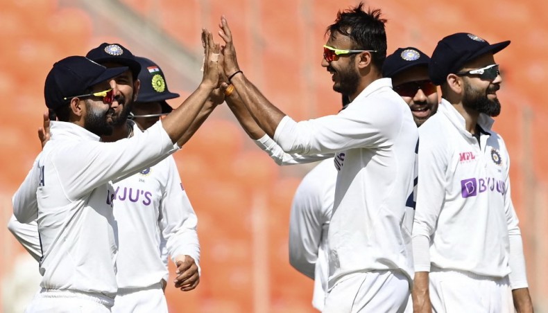 India's Axar Patel (C) celebrates the wicket of England's Ben Foakes with team-mates on the on the third day of their fourth Test at the Narendra Modi Stadium in Motera on Saturday. – AFP photo