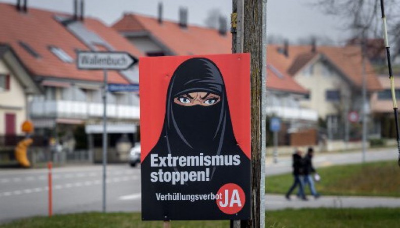 A campaign poster, in favour of the burqa ban initiative reading in German: