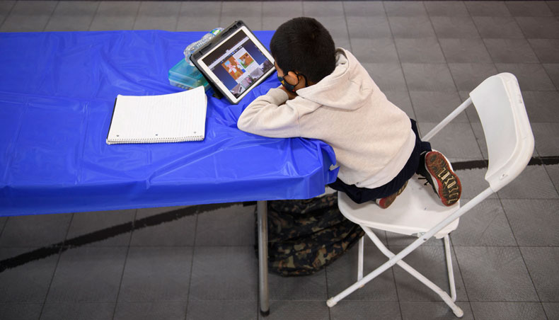 In this file photo a child attends an online class at a learning hub inside the Crenshaw Family YMCA during the COVID-19 pandemic on February 17, 2021 in Los Angeles, California. — AFP photo