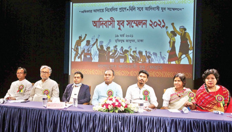 Guests attend Adibasi Juba Sammelan 2021 organised by Bangladesh Adibasi Juba Forum at the Liberation War Museum in Dhaka on Friday. — New Age photo
