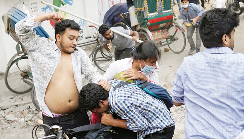 Protesters against the upcoming visit of Indian prime minister Narendra Modi come under an attack from Bangladesh Chhatra League on the Dhaka University campus on Tuesday. — Sourav Lasker