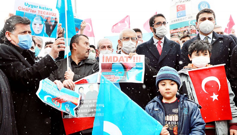 Uighurs living in Turkey attend a protest against the visit of China’s state councillor and foreign minister Wang Yi to the Turkish capital in front of the Chinese embassy in Ankara, on Thursday. — AFP photo