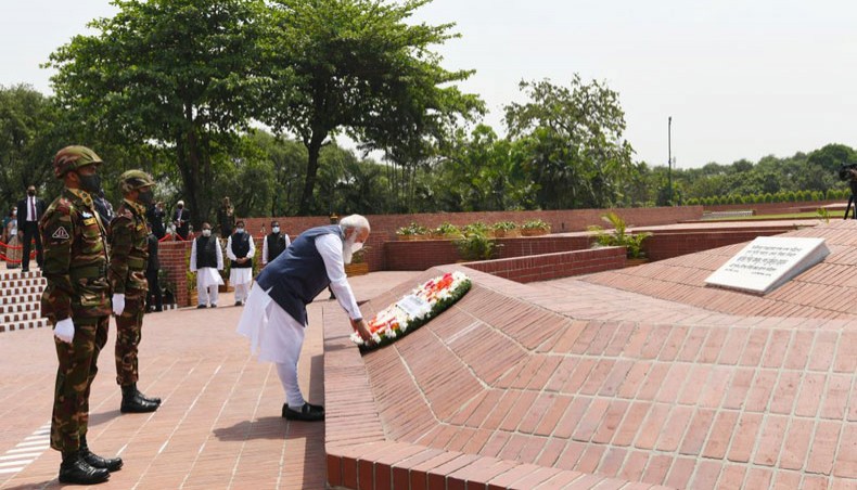 Indian prime minister Narendra Modi offers a wreath at the altar of the National Memorial in Savar on Friday. — New Age Photo