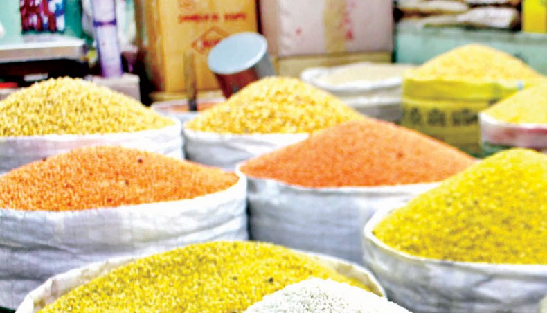 A file photo shows different types of lentils and chickpea at a grocery store at the Kaptan Bazar kitchen market in the capital. The Bangladesh Bank on Sunday asked scheduled banks to charge margins at a minimum rate against opening of import letters of credit for essential kitchen commodities ahead of the month of Ramadan. — Focusbangla photo