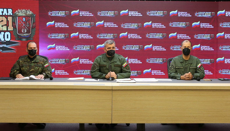 Hand-out picture released by the Venezuelan Presidency of Venezuela’s Venezuelan defence minister Padrino Lopez, speaking next to the commander of the Armed Forces Operational Strategic Command, Remigio Ceballos and the second-in-chief General of Military Aviation Pedro Juliac, during a broadcast message at Miraflores Presidential Palace in Caracas on April 5, 2021. — AFP photo