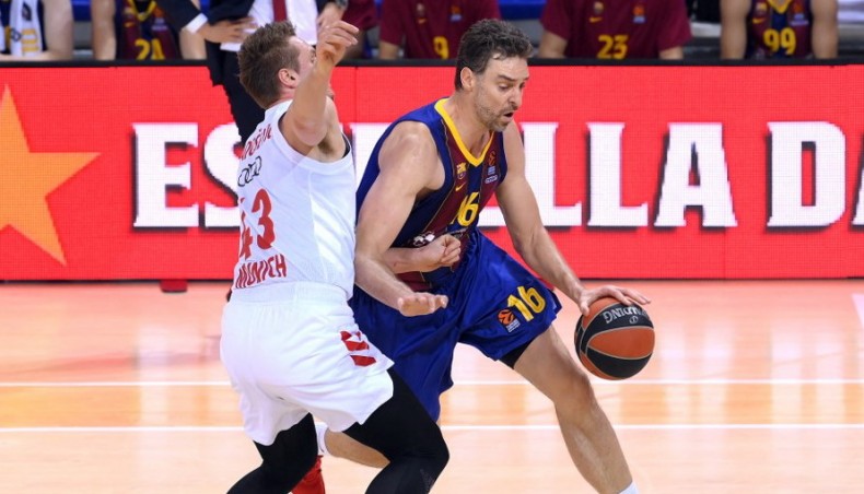 Bayern Munich centre Leon Radosevic (L) challenges Barcelona centre Pau Gasol during their Euroleague basketball match at the Palau Blaugrana arena in Barcelona on Friday. — AFP photo