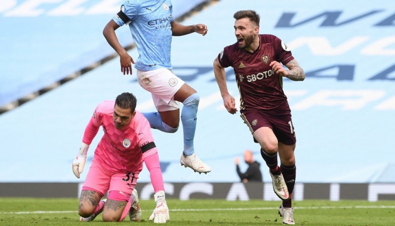 Leeds United midfielder Stuart Dallas (R) celebrates after scoring his team’s second goal against Manchester City during their Premier League match at the Etihad Stadium in Manchester on Saturday. — AFP photo