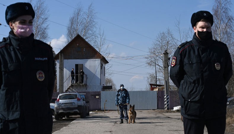Russian police officers guard the entrance to the penal colony N2, where Kremlin critic Alexei Navalny has been transferred to serve a two-and-a-half year prison term for violating parole, in the town of Pokrov on April 6, 2021. — AFP Photo