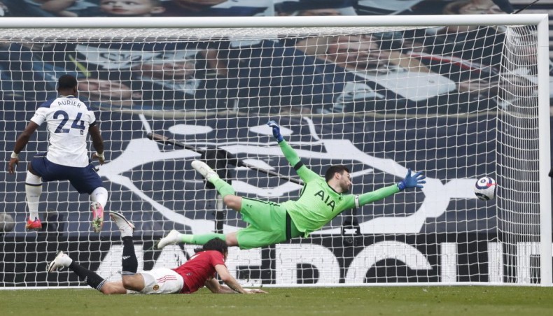 Manchester United striker Edinson Cavani (C) heads to score his team's second goal against Tottenham Hotspur during their Premier League match at the Tottenham Hotspur Stadium in London on Sunday.-- AFP photo