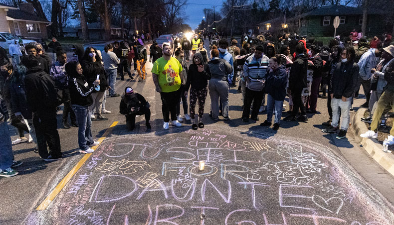 People gather at the spot where a police officer shot and killed a black man in Brooklyn Centre, Minneapolis, Minnesota on April 11, 2021. — AFP photo