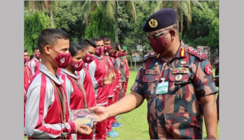 Director general of Border Guard Bangladesh major general Md Safinul Islam distributes prizes among the medal winning BGB players in Bangabandhu 9th Bangladesh Games-2020 on Tuesday. — Press Release