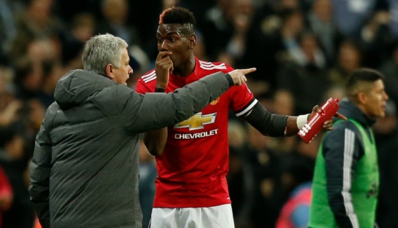 A file photo shows former Manchester United manager Jose Mourinho giving some directions to Paul Pogba during a match.-- Twitter photo