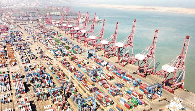A file photo shows an aerial picture of cranes and containers at the Lianyungang port container terminal in Lianyungang, Jiangsu province. China’s economy grew at a record pace during the first quarter as it rebounded from a historic contraction caused by COVID-19, and boosted by exports and domestic demand. — AFP photo