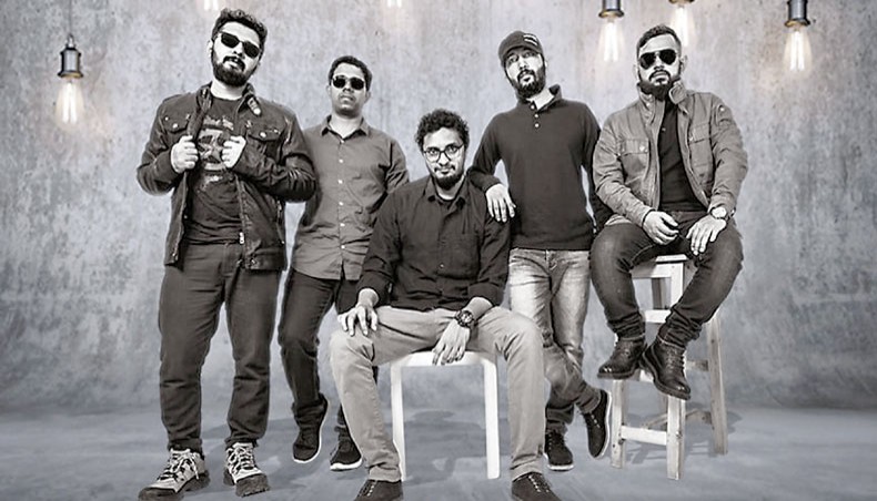 Ziaur Rahman Zia, second from right, along with members of Shironamhin pose for a photo. Courtesy: Shironamhin