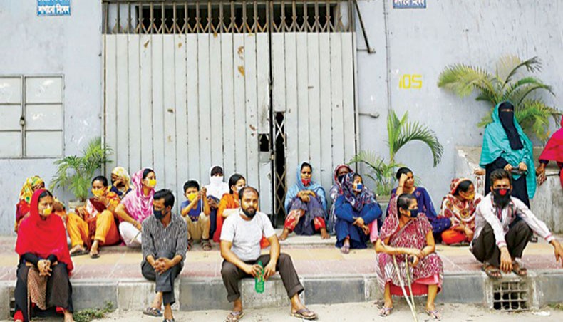 A file photo shows workers protesting against non-payment of wages in front of a readymade garment factory in the capital in April 2020. Wage earning workers have felt the brunt of COVID-19 outbreak in the country as their incomes have shrunk the most amid the crisis, according to a study conducted by the Centre for Policy Dialogue.— New Age photo