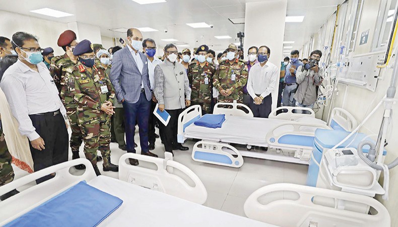 Health minister Zahid Maleque, among others, visits the specialised Covid hospital set up at a building of Dhaka North City Corporation at Mohakhali after inauguration on Sunday. — New Age photo