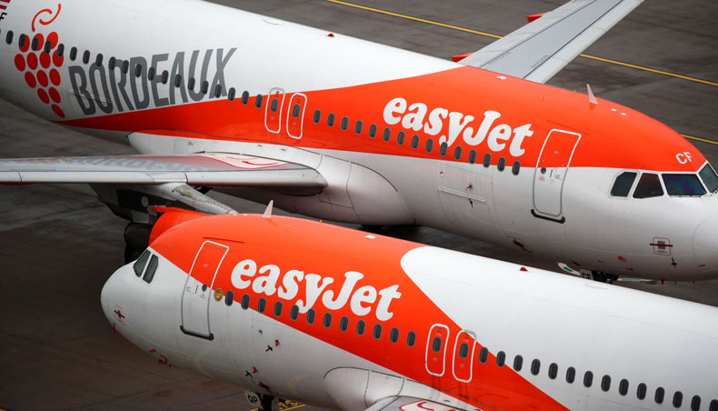 In this file photo taken on October 31, 2020 EasyJet airplanes are parked on the tarmac during the official opening of Berlin’s airport ‘Berlin Brandenburg Airport Willy Brandt’, in Schoenefeld, southeast of Berlin. — AFP photo