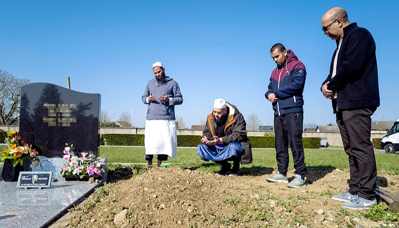 In this file photo taken on April 6, 2020, relatives say prayer at an Islamic funeral for a man victim of the Covid-19 in Wittenheim, eastern France, during a strict lockdown in France. — Agence France-Presse/Sebastien Bozon