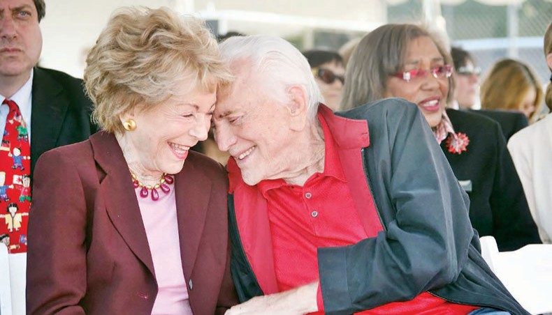 In this file photo taken on May 28, 2008 Actor Kirk Douglas and wife Anne attend the Anne and Kirk Douglas 400th Playground Dedication at Lillian Street Elementary School, in Los Angeles, California. — AFP photo