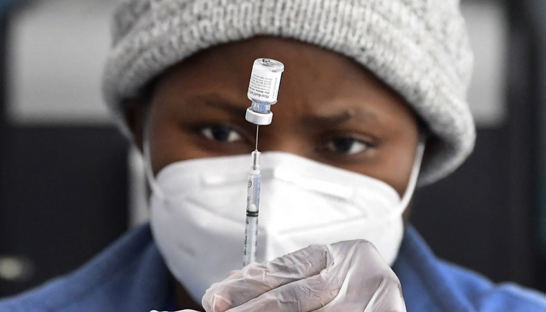 In this AFP file photo a nurse prepares the Pfizer Covid-19 vaccine at a public housing project pop-up site targeting vulnerable communities in Los Angeles, California on March 10, 2021.