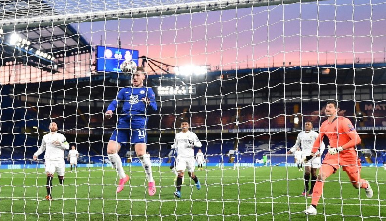 Chelsea striker Timo Werner (C) heads to score his team’s opening goal against Real Madrid during their UEFA Champions League semi-final second leg match at the Stamford Bridge on Wednesday. — AFP photo