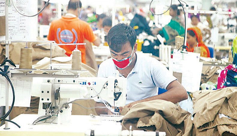 A file photo shows workers sewing clothes at a garment factory on the outskirts of Dhaka. Bangladesh’s apparel export to the United States fell by 8.55 per cent in January-March of 2021 compared with that in the same period of the previous year as the demand for woven garments decreased on the market due to the Covid-19 pandemic. — New Age photo