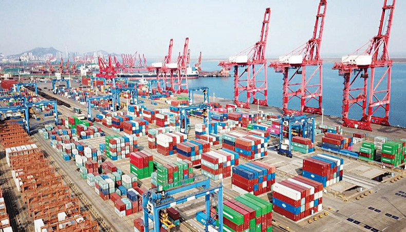 A file photo shows shipping containers for export stacked at a port in Lianyungang, in China’s eastern Jiangsu province on March 7. Chinese exports grew at a forecast-busting rate in April, data showed on Friday, while imports surged at their strongest in a decade as the global economy bounces back from the pandemic crisis and domestic consumption recovers. — AFP photo