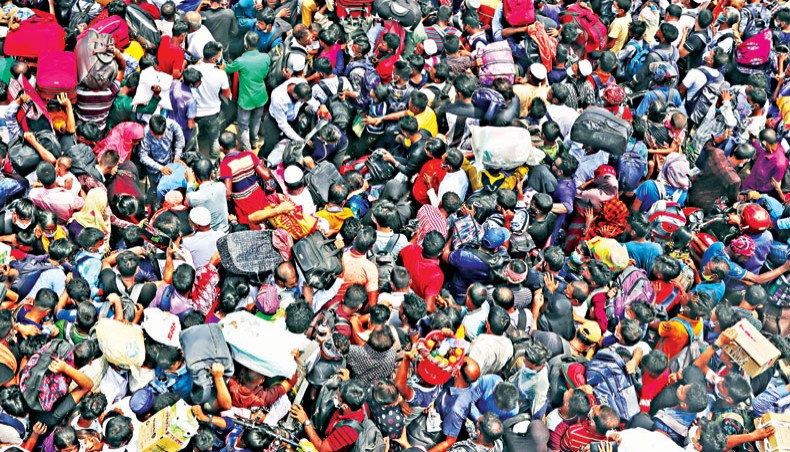 People defying health rules crowd the deck of a ferry at Shimulia Ferry Terminal in Munshiganj on Saturday. — Sony Ramany