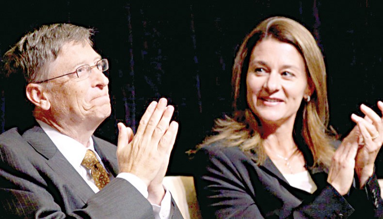 Microsoft chairman Bill Gates and his wife Melinda attend a ceremony at the Library of Congress on October 15, 2010 in Washington, DC. — Common Dreams/Getty Images/Win McNamee