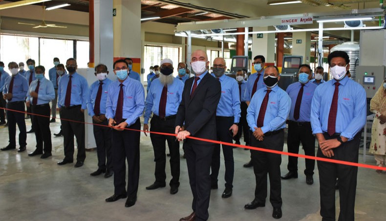 Participants attend the inauguration of the production line of Singer washing machines at the Singer Manufacturing Plant in Savar on May 6. — Press Release
