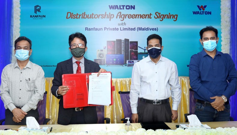 Participants pose for a photo at an agreement signing ceremony between Bangladeshi electronics brand Walton and Ranfaun Private Limited in Maldives on Tuesday. — Press Release