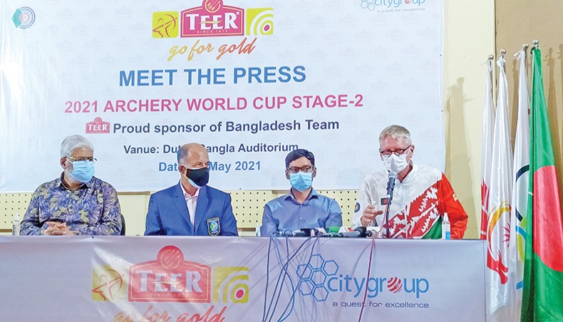 Bangladesh archery team’s German coach Martin Frederic (R) speaks during a press conference at the Bangladesh Olympic Association’s Dutch Bangla Auditorium on Tuesday. — New Age photo
