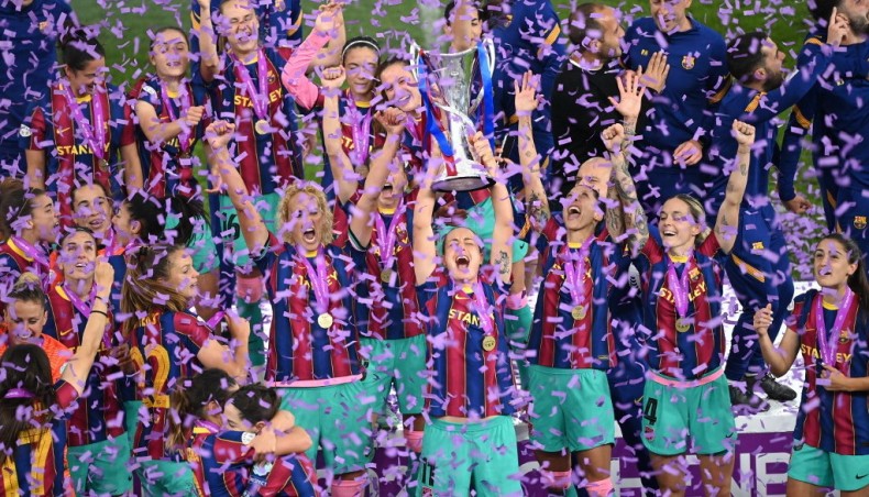 Barcelona players celebrate with the trophy after winning the UEFA Women's Champions League final against Chelsea in Gothenburg on Sunday. — AFP photo