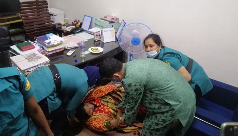 A collected photo of the Prothom Alo journalist Rozina Islam falling sick while kept confined in a room of a health ministry official in the secretariat in Dhaka on Monday.