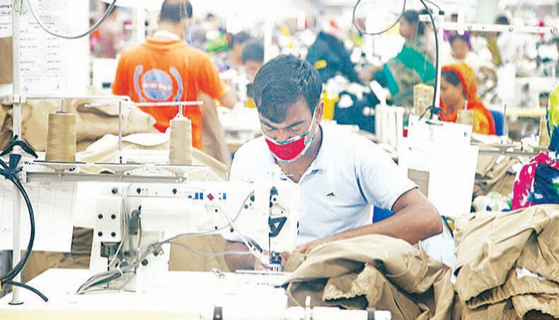 A file photo shows workers sewing clothes at a garment factory on the outskirts of Dhaka. Garment workers unions and rights groups across the world have demanded waiving the Trade Related Aspects of Intellectual Property Rights temporarily to allow low and middle-income garment manufacturing countries access to Covid-19 vaccine. — New Age photo
