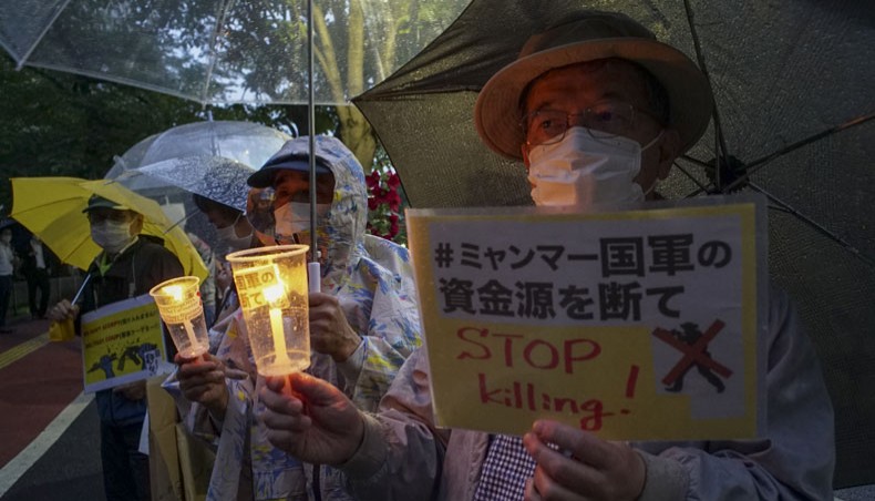 Demonstrators protest against the military coup in Myanmar during a rally in front of the foreign ministry in Tokyo on May 21. —AFP
